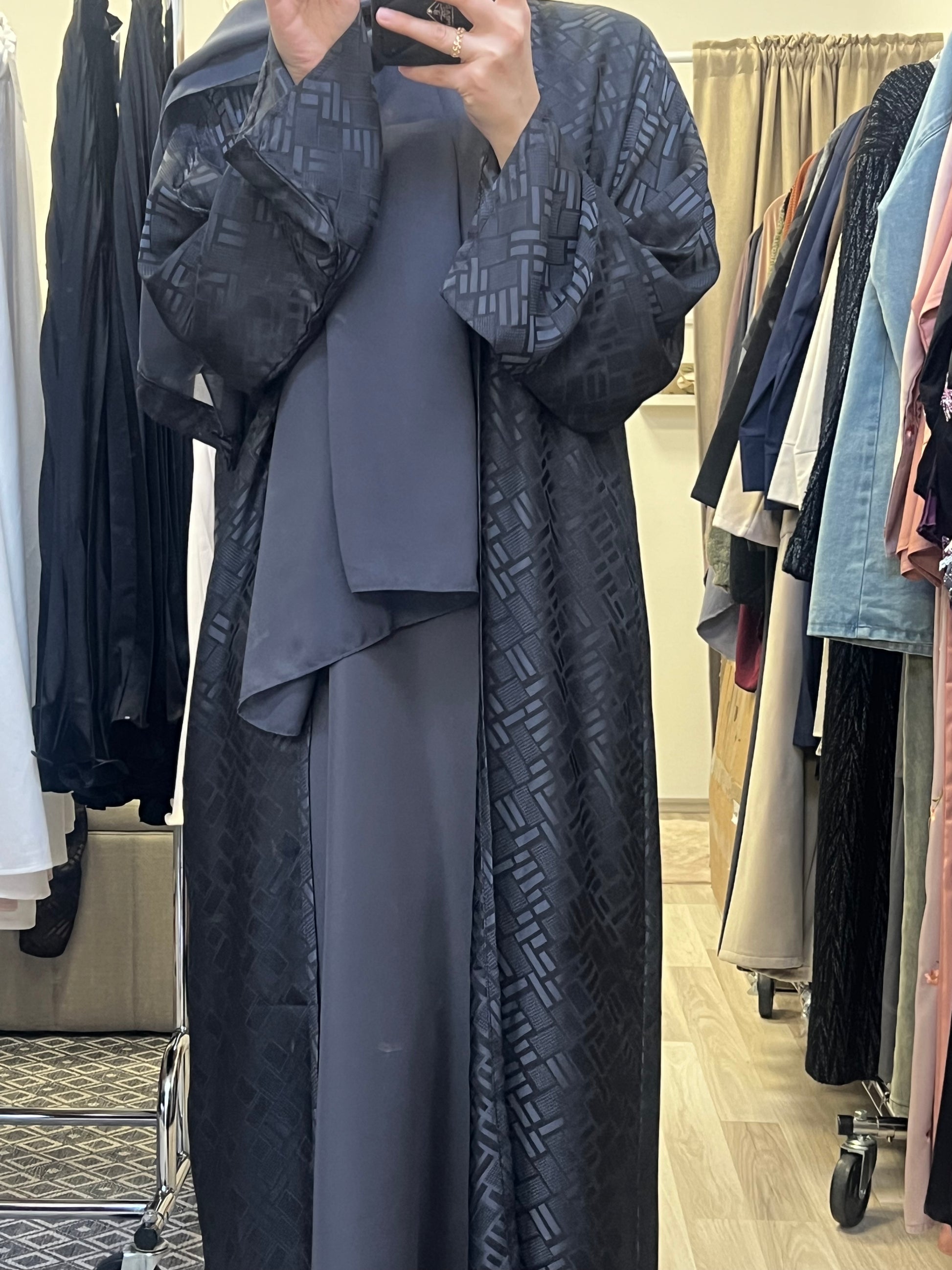 Strukturdetail schwarzer Jacquard Stoff Nahaufnahme